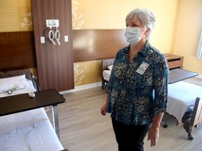 OTTAWA - APRIL 28, 2020 - Lianne Learmonth, Clinical Director of Patient Care at the Queensway Carleton Hospital, shows a room set up for COVID-19 patients at the Fairfield Inn and Suites in Kanata, which has been rented by the hospital and re-purposed into a COVID-19 care facility.