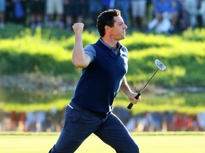 Rory McIlroy of Europe reacts on the 16th green after making a putt to win the match during afternoon fourball matches of the 2016 Ryder Cup at Hazeltine National Golf Club on September 30, 2016 in Chaska, Minnesota. McIlroy says Ryder Cups are much better with fans in attendance.