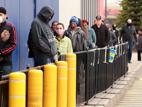 OTTAWA - MAY 1, 2020 -  Lineups outside the Walmart in Barrhaven Friday.