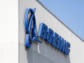 In this file photo the Boeing logo is pictured at its Renton Factory, where the Boeing 737 MAX airliners are built in Renton, Wash.,on April 20, 2020.