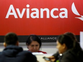 The logo of Avianca Airlines is pictured at a counter following the cancellation of Avianca flight 431, after El Salvador's President Nayib Bukele accused Mexico of allowing a dozen confirmed coronavirus (COVID-19) cases to board the flight due to leave Mexico City for San Salvador, at the Benito Juarez International Airport in Mexico City, Mexico, March 16, 2020.