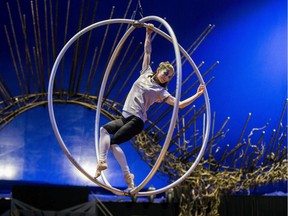 A Cirque du Soleil artist performs acrobatic moves during during a rehearsal in 2019.