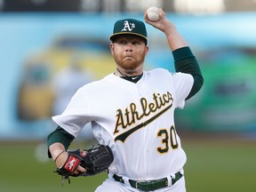 Brett Anderson of the Oakland Athletics pitches in the top of the first inning against the Los Angeles Angels of Anaheim at Oakland-Alameda County Coliseum on March 30, 2019 in Oakland, California.