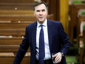 Canada's Minister of Finance Bill Morneau arrives to a meeting of the special committee on the COVID-19 pandemic, as efforts continue to help slow the spread of the coronavirus disease (COVID-19), in the House of Commons on Parliament Hill in Ottawa, Ontario, Canada May 13, 2020.