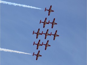 The Canadian Forces Snowbirds fly over Fort McMurray, Alta. on May 15.