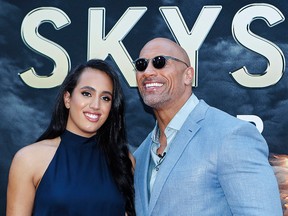 Dwayne Johnson and his daughter Simone Alexandra Johnson attend the premiere of "Skyscraper" on July 10, 2018, in New York City.