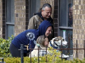 A family has a window visit with their mother and grandmother at the Orchard Villa Retirement Centre on Mother's Day, May 10, 2020 in Pickering.