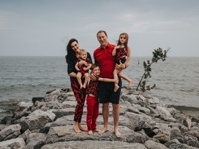 Nazanin Afsham-Jam MacKay poses for a family portrait with her husband, Conservative party frontrunner Peter MacKay, and their two kids.