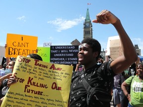 Thousands gathered in front of Parliament Hill in Ottawa to protest racism and march in the memory of George Floyd on June 05, 2020.