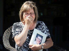 Louise Savoie tries to hold back her tears when she talks about how her mom, Thérèse Savoie, 83, died alone Sunday at the Montfort long-term care facility.