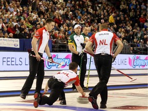 Brad Gushue of Newfoundland and Labrador throws a stone during a 2016 Tim Hortons Brier game at TD Place arena in Ottawa.