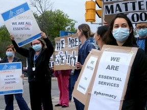 Upwards of 100 healthcare workers (physiotherapists, X-ray techs and dozens of other classifications within Allied Health Professionals) protested being left out of pandemic pay outside The Ottawa Hospital's General campus Tuesday.