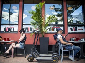 Patrons enjoying the beautiful weather were on the patio at the Wellington Diner on Sunday.