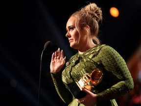 Singer Adele accepts the award for Song of The Year for "Hello" during The 59th Grammy Awards at Staples Center in Los Angeles, Feb. 12, 2017.