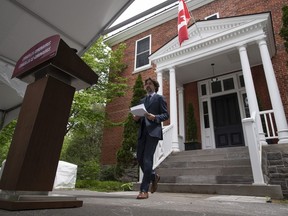 Prime Minister Justin Trudeau makes his way to the podium for a news conference outside Rideau Cottage in Ottawa, Tuesday June 2, 2020.