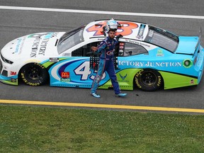 Driver Bubba Wallace (43) waves to fans after competing in the Geico 500 at Talladega Superspeedway on Monday.