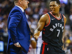 Raptors head coach Nick Nurse (left) says Kyle Lowry and the Raptors are looking good in training in Florida.