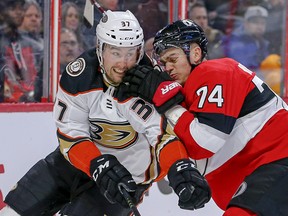 Senators’ Mark Borowiecki (right) battles with the Sabres’ Nick Ritchie. Don Brennan thinks the Senators should sign the Senators long-term.