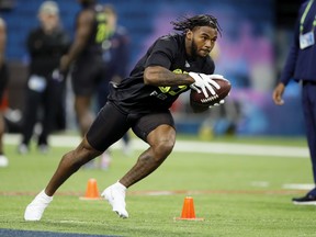 Georgia running back D'Andre Swift runs a drill at the NFL football scouting combine in Indianapolis. Swift was chosen by the Detroit Lions in the second round in late, April.