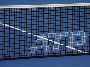 A view of the ATP logo on an official net on the grandstand court during the Western and Southern Open tennis tournament at Lindner Family Tennis Center.
