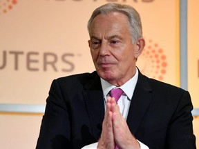 Former British Prime Minister Tony Blair speaks during an interview with Axel Threlfall at a Reuters Newsmaker event on "The challenging state of British politics" in London, Nov. 25, 2019.