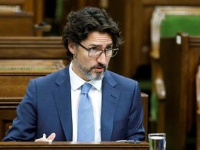 Canada's Prime Minister Justin Trudeau waits for a meeting of the special committee on the COVID-19 pandemic to begin on Parliament Hill in Ottawa on Wednesday, May 13, 2020.