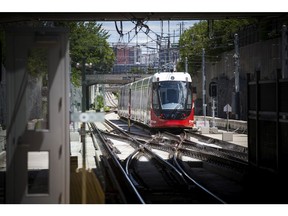 A train rolls into Tunney's Pasture Station.