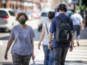 File photo/ Many people out and about in the Glebe wearing masks