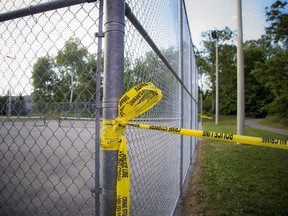 Ottawa police homicide detectives are investigating after a man's body was found behind Collège catholique Samuel-Genest on Carsons Rd Monday July 27, 2020. A park in the area was also roped off with police tape.