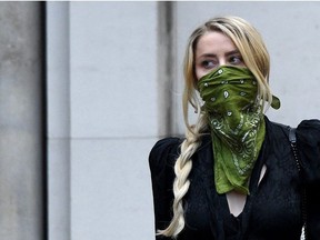 Amber Heard leaves the Royal Courts of Justice, Strand on July 10, 2020 in London, England.