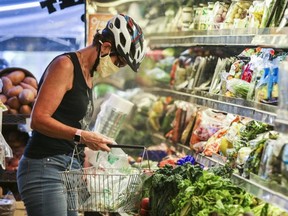 Catherine Becker shops at Royal York Meat Market in Toronto on July 7, 2020.