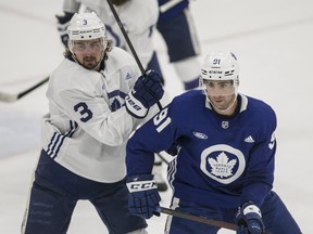 Leafs captain John Tavares (right) competes during training camp this week.