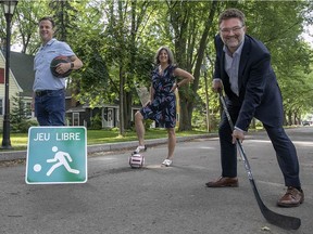 Gatineau Mayor Maxime Pedneaud-Jobin, right, poses for a photo to help promote the "free play pilot project.