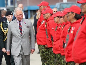Prince Charles, Prince of Wales reviews Canadian Rangers during a 2017 visit at the Nunavut Legislative Assembly in Iqaluit.