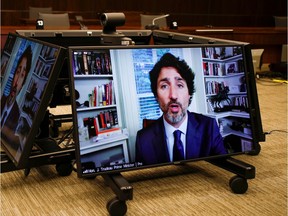 Prime Minister Justin Trudeau attends a House of Commons finance committee meeting via a video chat, in Ottawa on July 30, 2020.