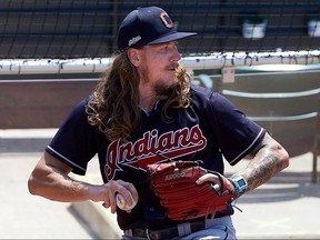 In this handout image provided by the Cleveland Indians, Mike Clevinger throws at Progressive Field on July 3, 2020 in Cleveland.