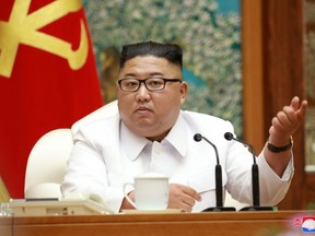 North Korean leader Kim Jong Un holds an emergency enlarged meeting of Political Bureau of WPK Central Committee in this undated photo released on Saturday, July 25, 2020 by North Korean Central News Agency, in Pyongyang.