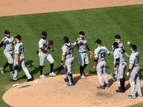 The Marlins celebrate following their victory over the Phillies at Citizens Bank Park, in Philadelphia, Sunday, July 26, 2020.