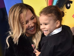 In this file photo taken Feb. 2, 2019, actress Naya Rivera and son Josey Hollis Dorsey arrive for the premiere of "The Lego Movie 2: The Second Part" at the Regency Village theatre in Westwood, Calif.