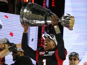 Henry Burris of the Ottawa Redblacks   with the 104th Grey Cup at BMO Field in Toronto, Ont. on Sunday November 27, 2016.