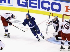 Tampa Bay's Ondrej Palat celebrates the game-winning goal by Brayden Point against the Blue Jackets in the fifth overtime period of Tuesday night's game in Toronto.