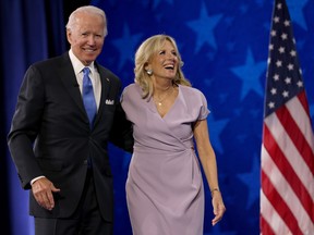 Democratic presidential nominee Joe Biden appears oh stage with his wife Dr. Jill Biden after delivering his acceptance speech on the fourth night of the Democratic National Convention from the Chase Center on Aug. 20, 2020 in Wilmington, Delaware.