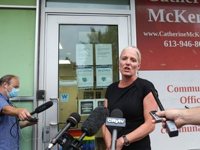 Catherine McKenna speaks to the media about an incident at her constituency office in Ottawa on Monday.