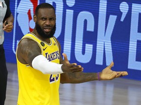 LeBron James of the Los Angeles Lakers reacts to a call against the Oklahoma City Thunder during the third quarter at HP Field House at ESPN Wide World Of Sports Complex on August 5, 2020 in Lake Buena Vista, Florida.