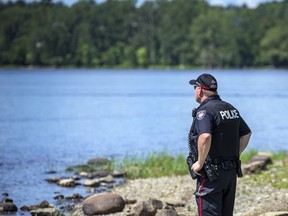 Ottawa police were on the water and combing the shoreline looking for one of two men who fell into the Ottawa River between Bate Island and Remic Rapids on Friday night.