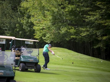 Joey Publow hits the ball on the fairway.