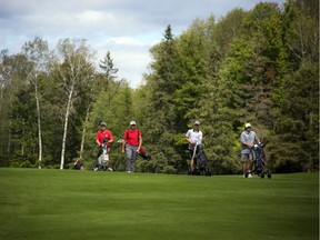 Kevin Haime Junior Open players walk down the fairway, at the 2020 Ottawa Sun Scramble.