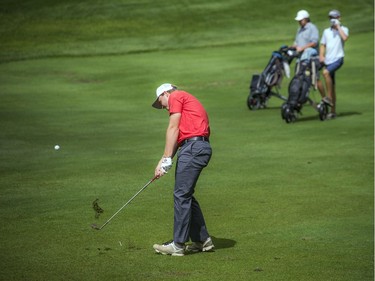 Ryan Baker hits the ball.