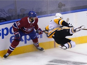 Canadiens' Jesperi Kotkaniemi takes down Penguins defenceman Brian Dumoulin during Eastern Conference qualifications last week. The young centre was a difference-maker for Montreal in the series.