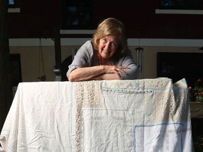 Lynda Turner made a bed spread and a mylar poster that she has donated to the City of Ottawa Archives' COVID collection.